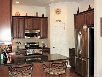 Eat in breakfast bar, large storage pantry, french