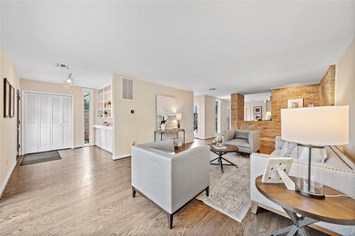 Left entryway transitions to the living room with