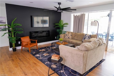 Living area with plenty of natural light, a ceilin
