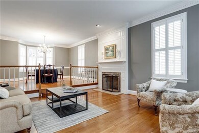 Formal living room is open to the formal dining ro
