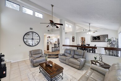 Spacious Living area features impressively high ce