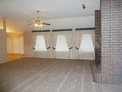 Living Room. Looking across the Living room are tr