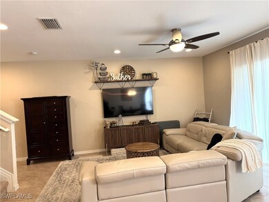 The spacious floorplan features living, dining and