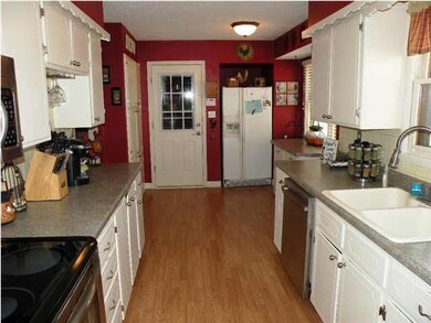 Lovely, updated kitchen with laminate flooring & s