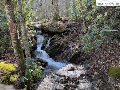 waterfall beside driveway