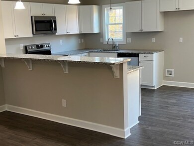 Kitchen with sink, appliances with stainless steel