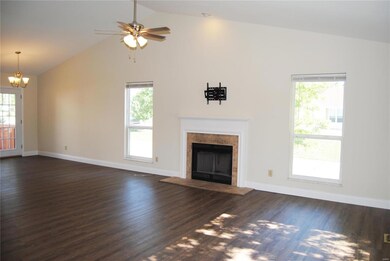 Great room with woodburning fireplace and breakfas