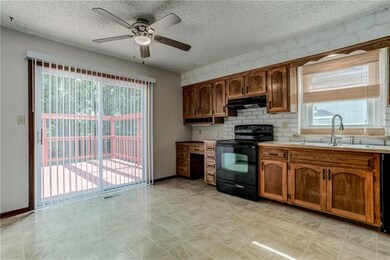 Large Eat-In Kitchen Flows Out to Deck/Backyard