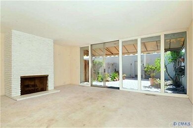Light & bright living room with fireplace