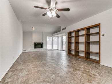 Unfurnished living room with ceiling fan, light ti