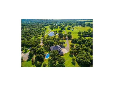 12 acres of heavily treed land with home tucked ba