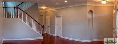 Family room with hardwood floors