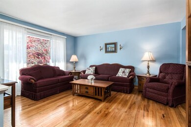 The large picture window floods the Living Room wi