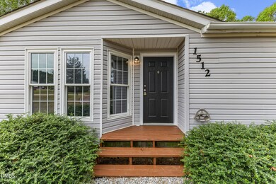 1512 Willow Downs Cir, Willow Spring, NC 27592 - photo 3