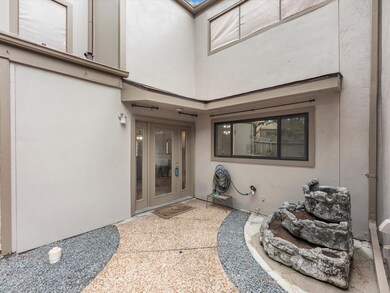 Privately gated entry & courtyard influenced patio