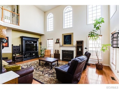 Gas fireplace and hardwood floors.