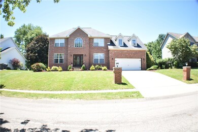 Beautiful custom built Brick front with brand new garage door.