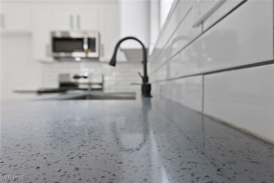 Interior details featuring stainless steel microwa