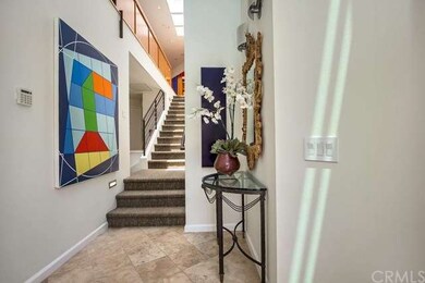 Vaulted ceilings and dramatic skylights greet you 
