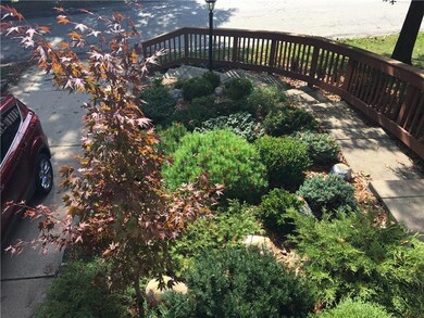 The approach to the front door has beautiful lands