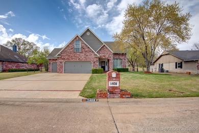 Front with large driveway