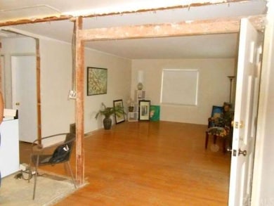Wall removed between Kitchen nook and Great room. 