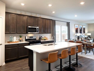Kitchen with appliances with stainless steel fini