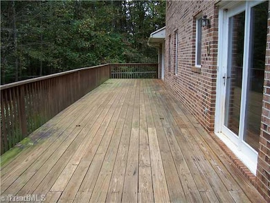 Patio/Deck. Doors from the sunroom and kitchen open to the 50  deck