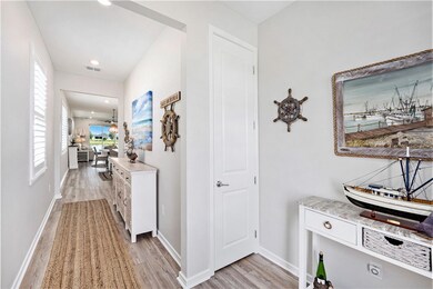Welcoming wide foyer, with coat closet, is a showcase space that leads you to a beautiful home.