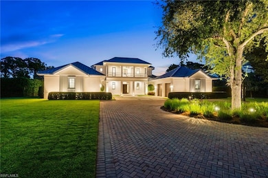 View of front of house with a yard
