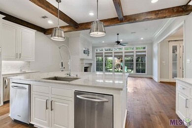 The dining room, garage door, utility, lockers, ma