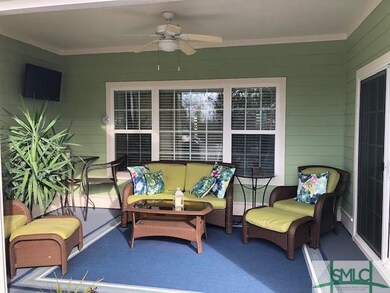 Covered and screened back porch