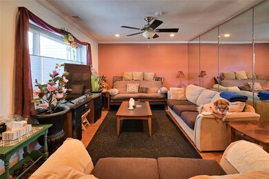 Living room with hardwood / wood-style flooring, c