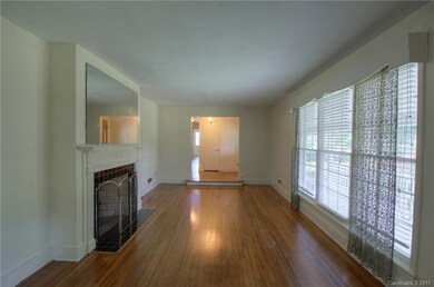 Large formal Living Room with lots of natural ligh