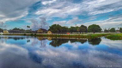 Panoramic view of lake and horse ranch from back p