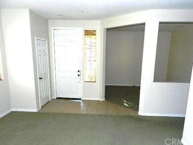 View from formal living room to entry