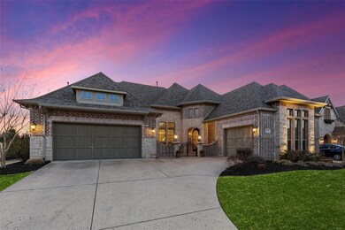 Beautiful exterior elevation with a 3 car split ga