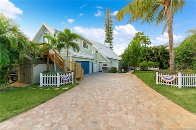 Efficiency Studio Apartment is above 2-car garage,