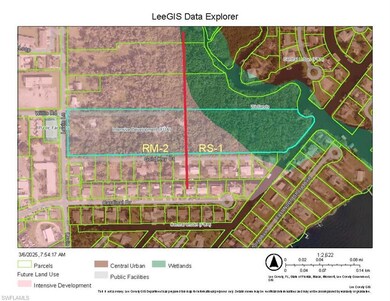 Aerial overview of property's location with property parcel outlined