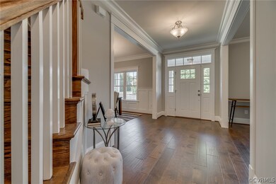 View from angled wood staircase into the BEAUTIFUL