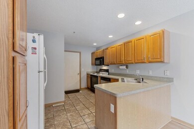 Kitchen with corner sink.