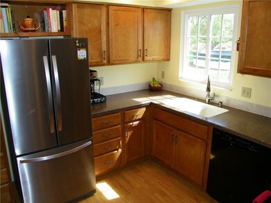 View from kitchen window overlooks backyard