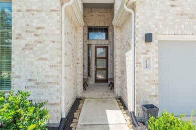 Wonderfully welcoming, the brick paved, covered fr