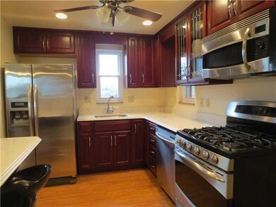 Kitchen. Gorgeous newer cherry kitchen with stainl