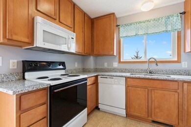 Main floor kitchen with brand new countertops and 