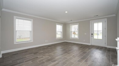 Interior space with dark hardwood / wood-style flo