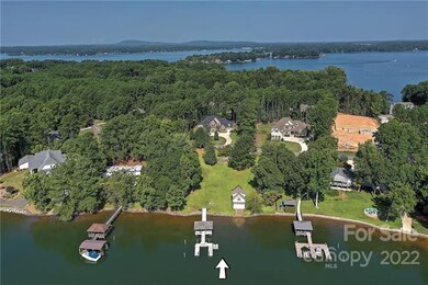 Aerial view 231 Barber Loop. Pier with covered sea
