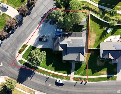 Aerial view of property and surrounding area featuring property boundaries highlighted