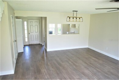 Living Room with view of Entry Way