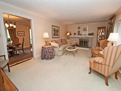 Elegant formal living room with accent of 10' mant